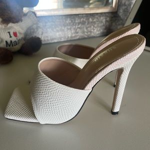 Selling this white brand new sandals. They are just big for me